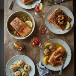Christmas fish and seafood dishes including salmon en croûte, prawn cocktail, baked salmon and scallops